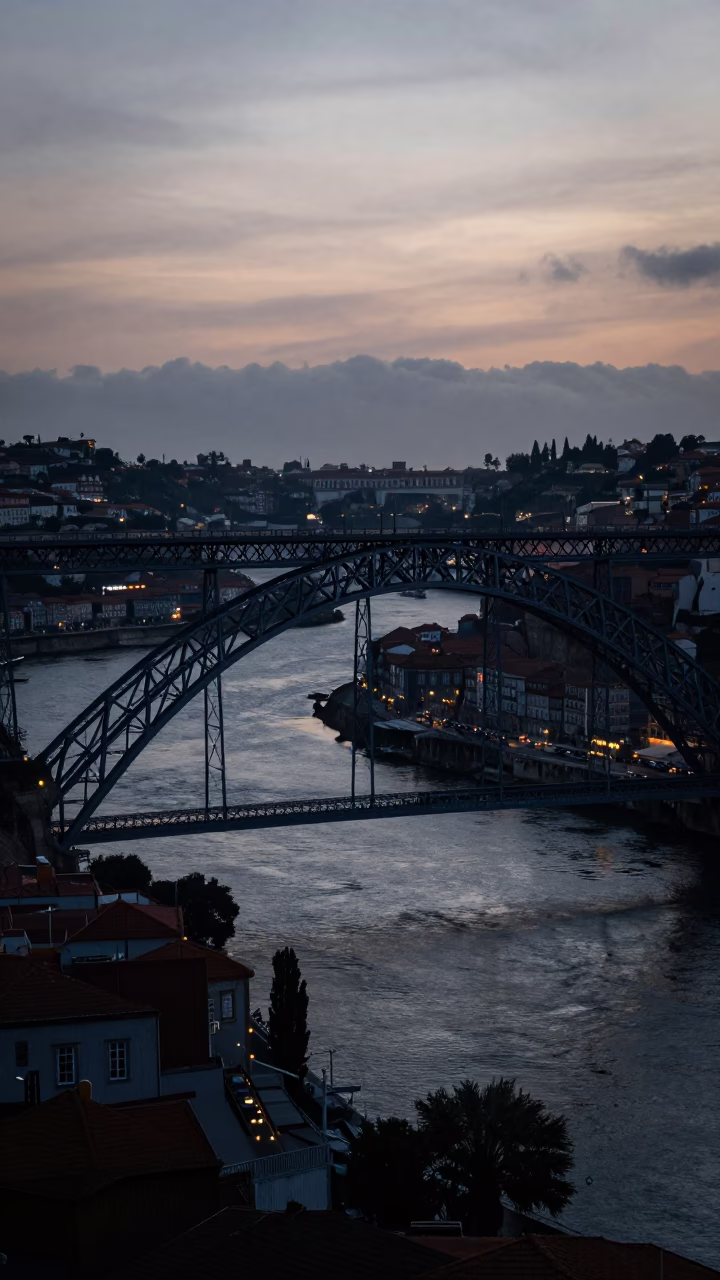 Predawn Porto Portugal Railway Viaduct Arches Spanning Valley Cityscape in in Porto, Portugal