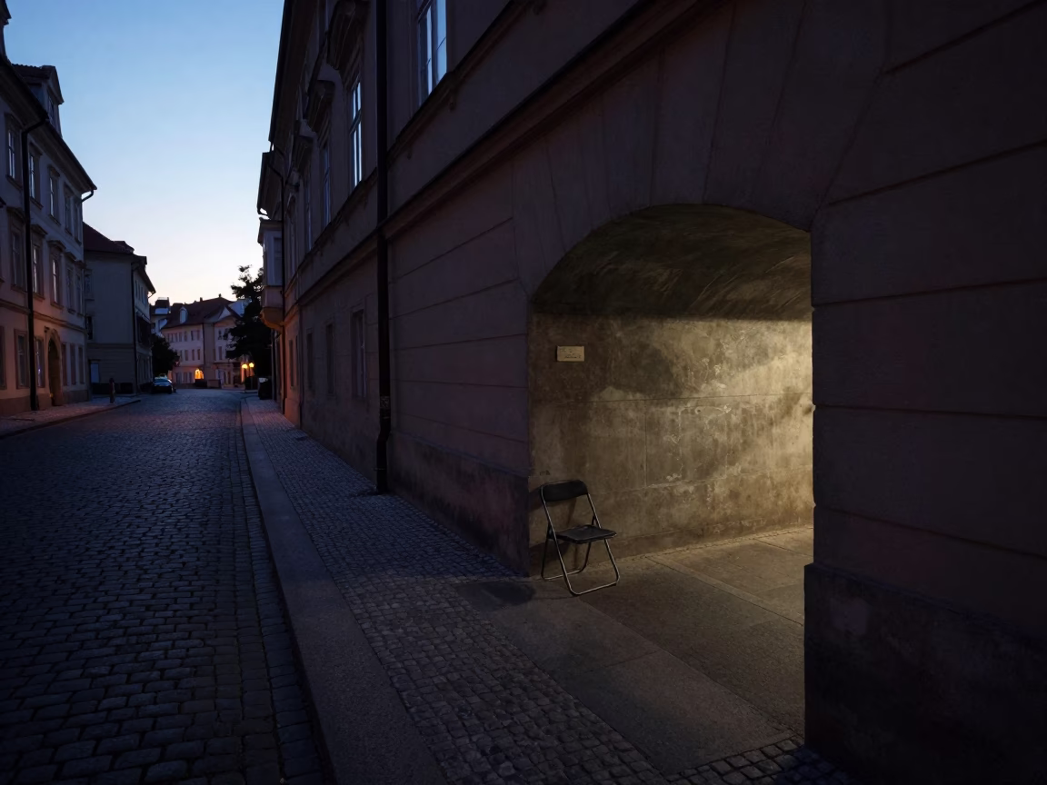 Predawn Prague Street Scene with Folding Chair and Concrete Tunnel Wall in in Prague, Czech Republic