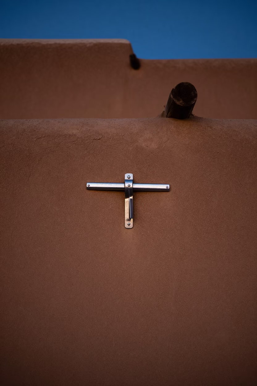 Predawn Santa Fe Adobe Wall with Nickel Latch and Small Dog in in Santa Fe, New Mexico, United States