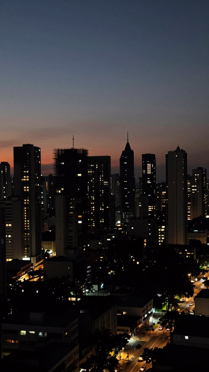 Predawn São Paulo Skyline and Construction Scaffolding Silhouette Against Dark Sky in in São Paulo, Brazil