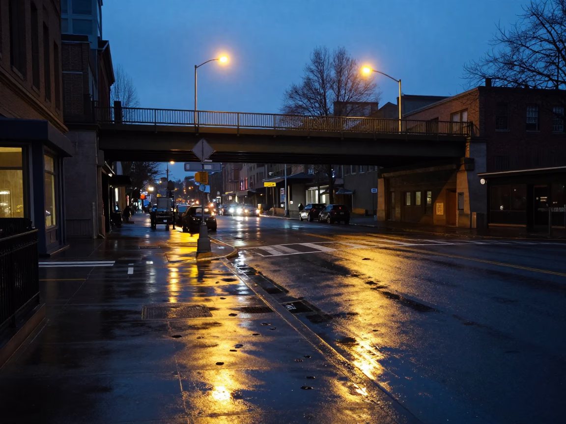 Predawn Seattle Street Scene with Pedestrian Overpass and Wet Footsteps in Rain in in Seattle, Washington, United States