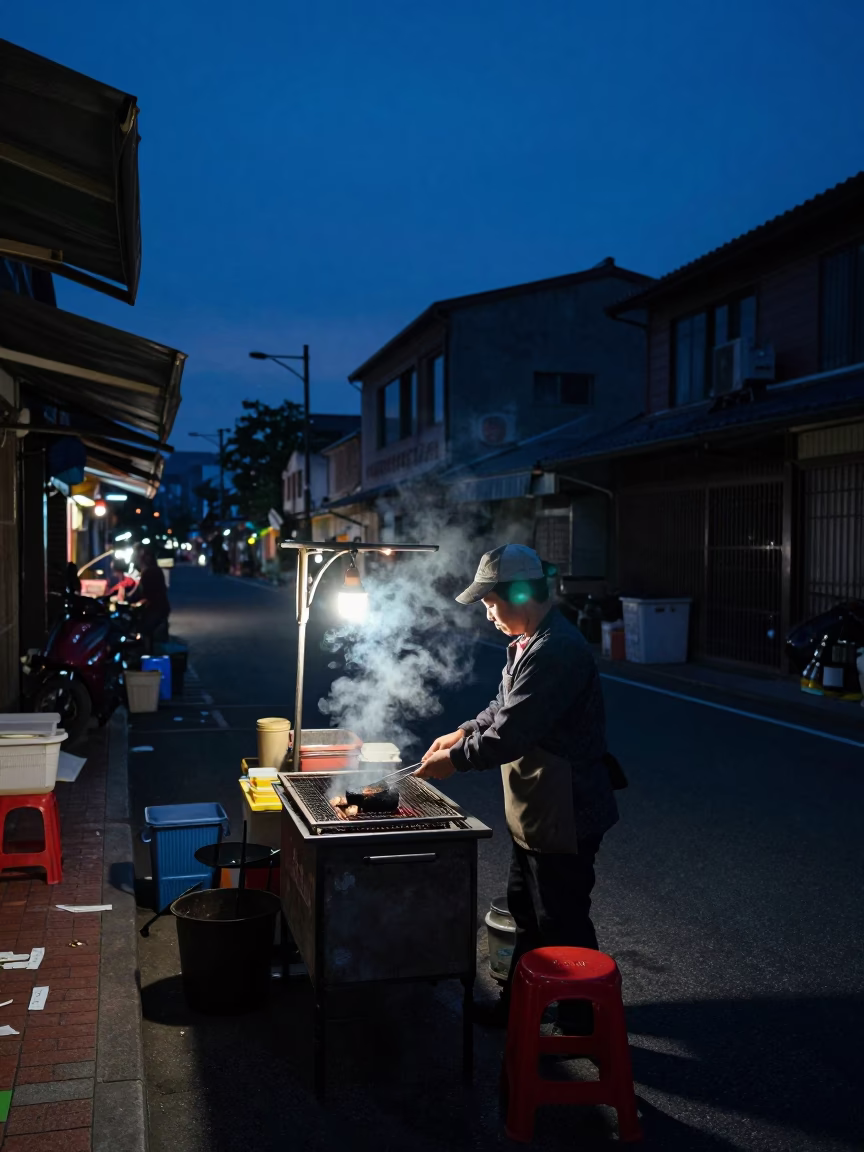 Predawn Street Food Stall in Tainan Taiwan with Night Light and Grill in in Tainan, Taiwan