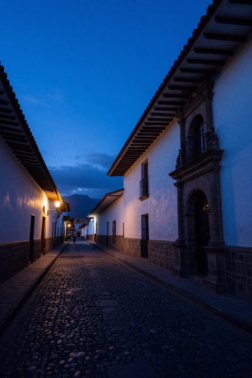 Predawn Street Scene in Cusco Peru with Colonial Architecture and Local Vendor in in Cusco, Peru