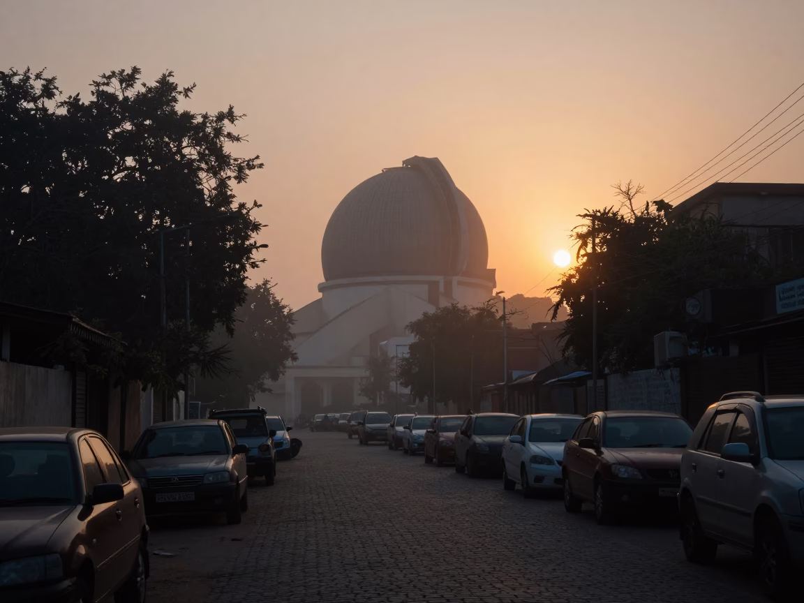 Predawn Street Scene in Jaipur India with Observatory Dome Silhouette and Morning Steam in in Jaipur, India