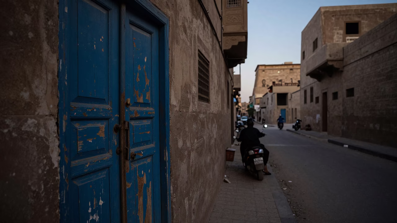 Predawn Street Scene in Luxor Egypt with Scuffed Painted Wood and Local Commerce in in Luxor, Egypt