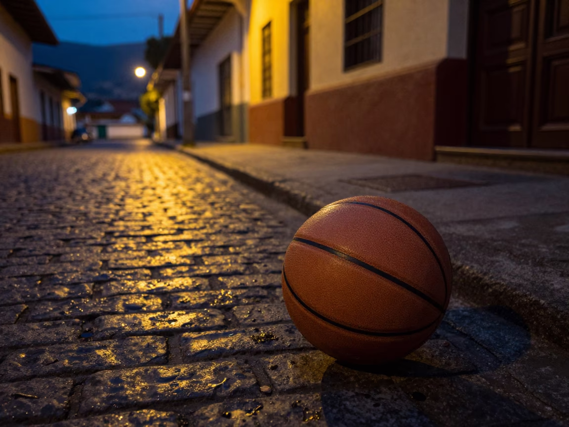 Predawn street scene in Medellin Colombia with leather basketball and wooden tray in in Medellin, Colombia