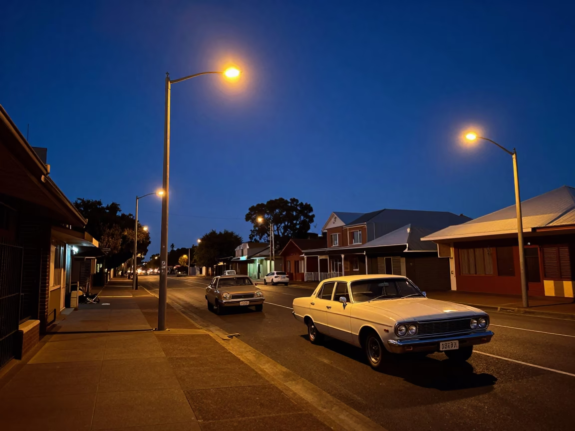 Predawn street scene in Perth Western Australia with vintage car and streetlights in in Perth, Western Australia, Australia