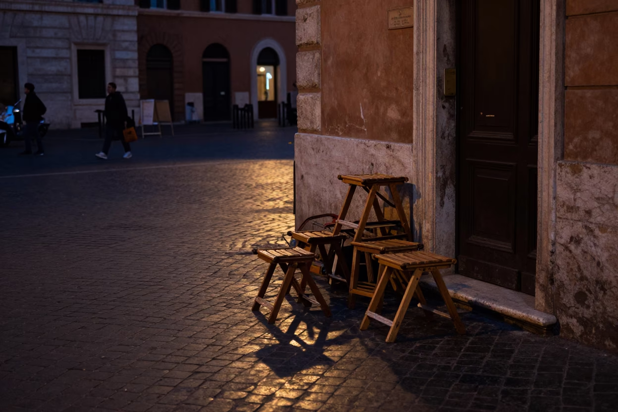 Predawn Street Scene in Rome Italy with Folding Stools and Early Morning Light in in Rome, Italy
