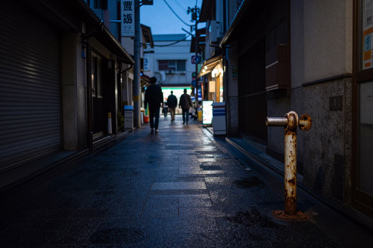 Predawn Tokyo Street Scene with Turnbuckle and Wet Pavement Reflections in in Tokyo, Japan