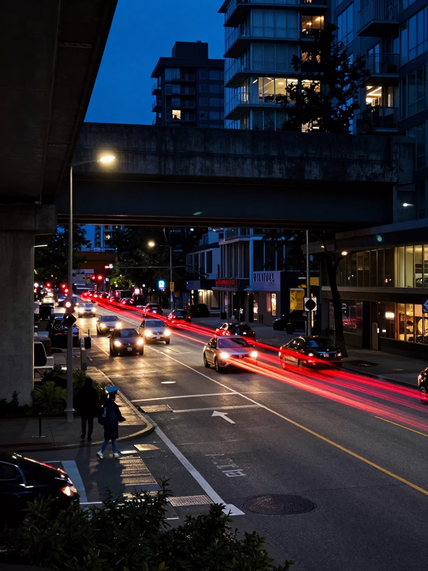 Predawn Vancouver Street Scene with Overpass Taillight Streaks and Rain Slicked Asphalt in in Vancouver, British Columbia, Canada