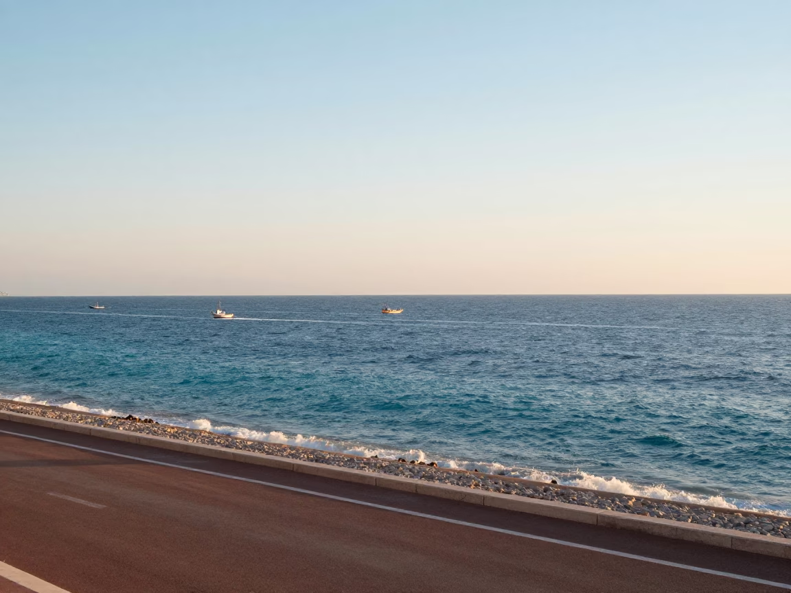 Promenade Des Anglais And Azure Mediterranean Sea just after sunrise in Nice in in Nice, France