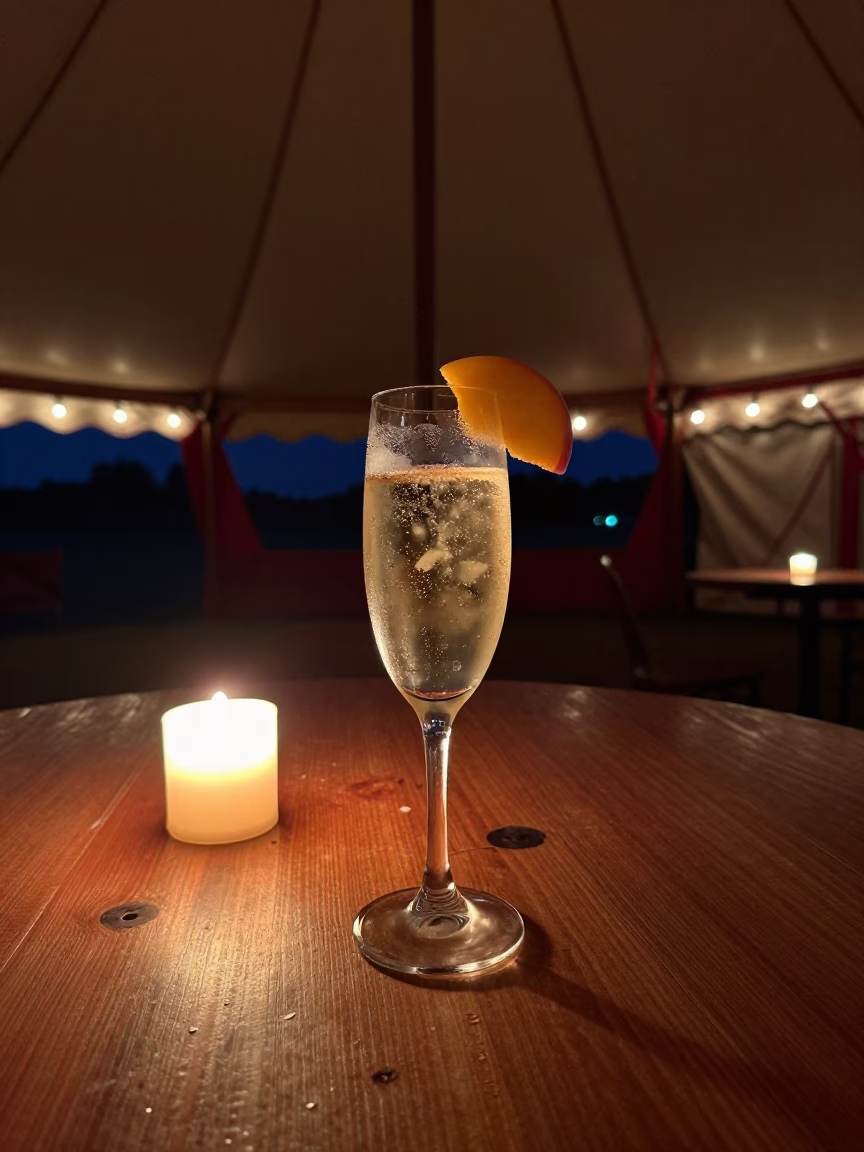 Prosecco Flute with Peach Under Circus Tent in under a circus tent in Southampton