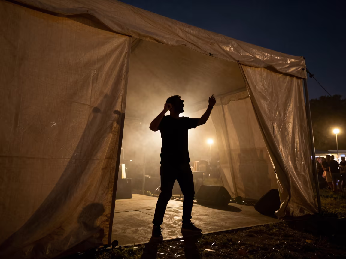 Puppeteer Under Smoke at Midnight Festival Stage in on a festival main stage in Cincinnati