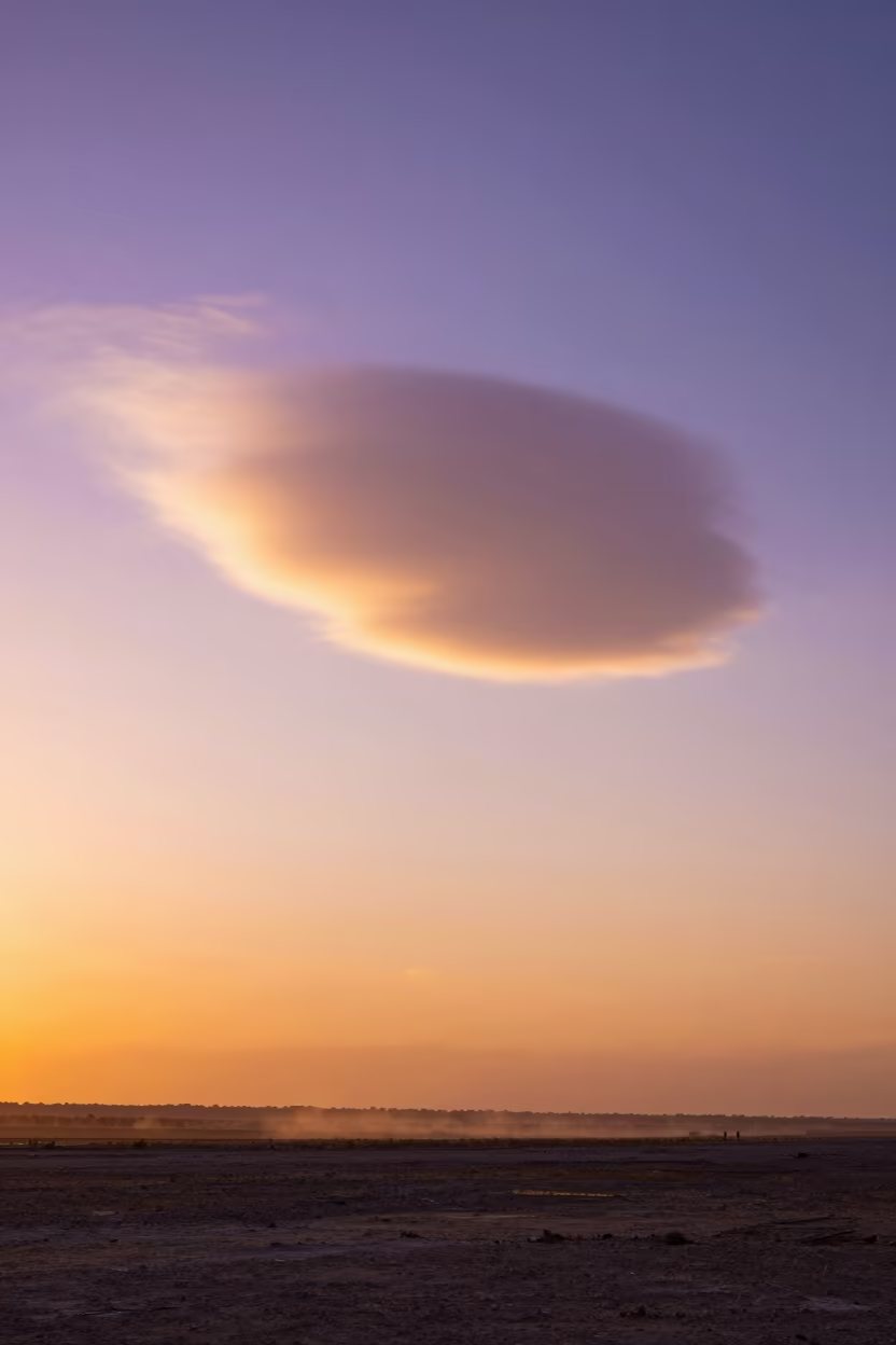 Purple Mammatus Clouds Over Kabul Plain at Sunset in across a storm-bright plain near Kabul