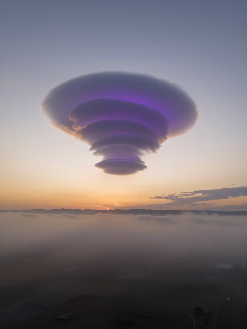 Purple Mammatus Clouds Over Uzbekistan Fog in through low marine fog in Uzbekistan