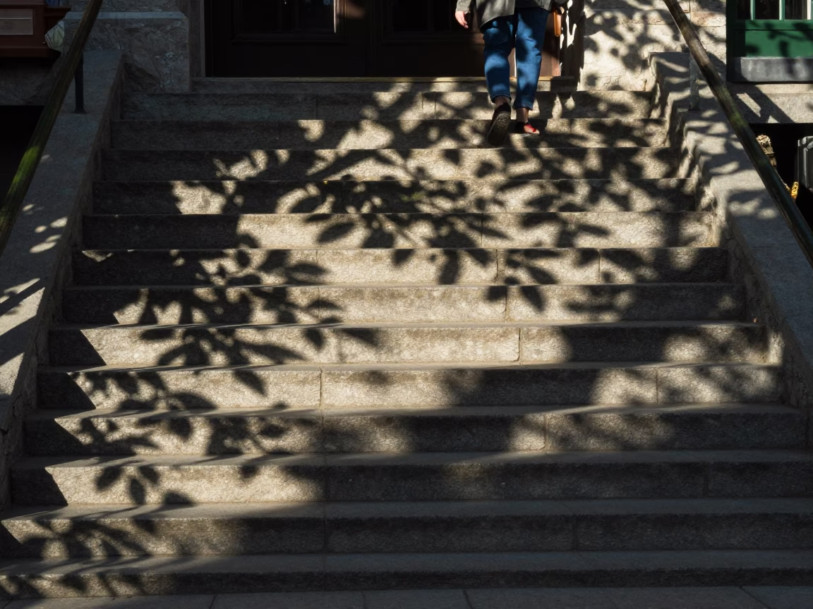Quebec City Late Afternoon Street Scene with Leaf Shadows on Tile in in Quebec City, Quebec, Canada