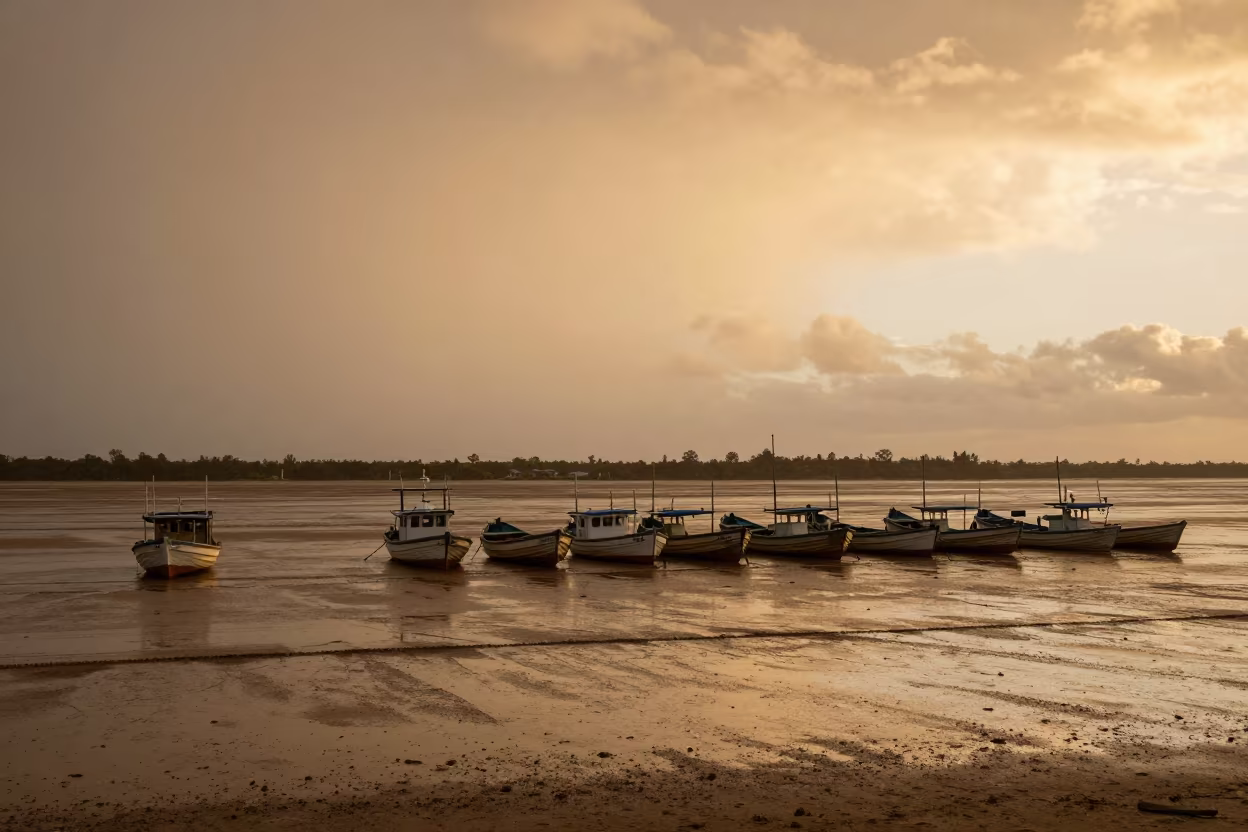 Queensland Harbor Boats in Amber Wet Season Light in across a floodplain after rain in Queensland