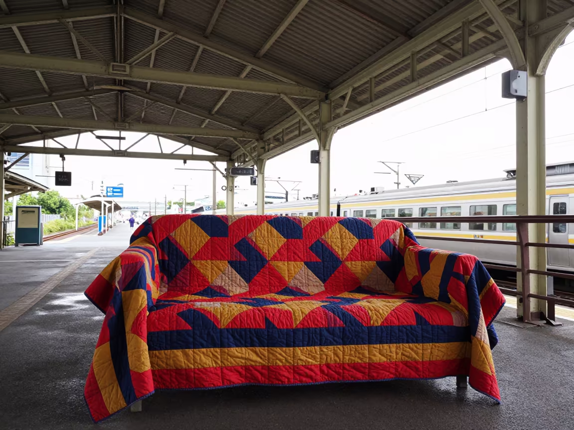 Quilt Daybed Under Sloped Ceiling Train Terminal in inside a restored train terminal in Yokohama