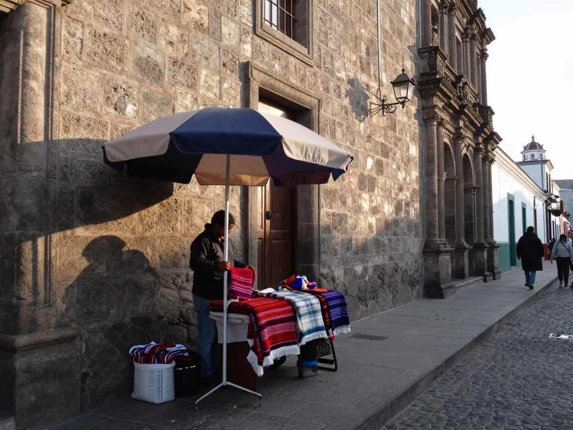Quito Ecuador Late Morning Street Scene with Umbrella Stand and Local Market Activity in in Quito, Ecuador