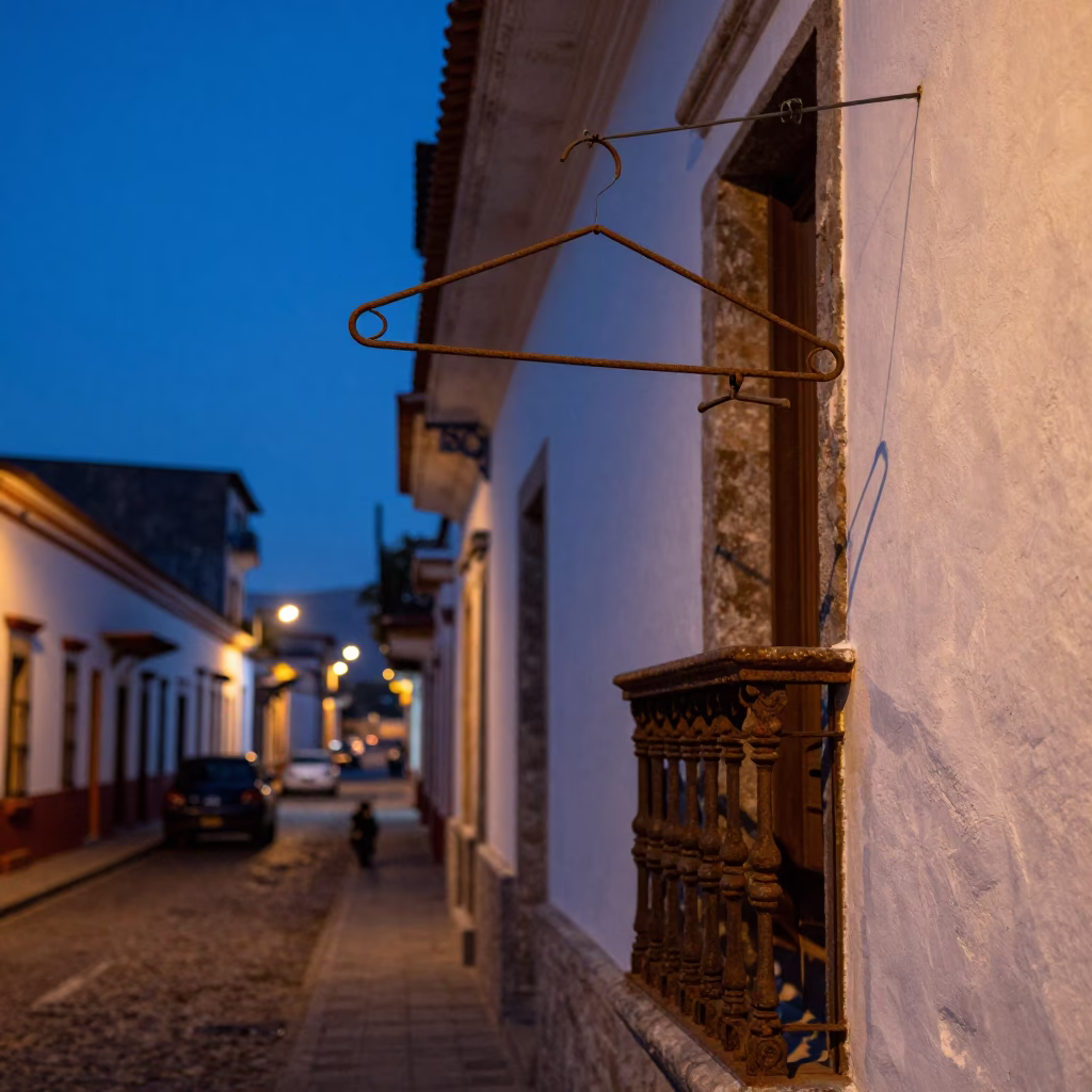 Quito Ecuador Pre-Dawn Street Scene with Shirt Hanger and Wall Sconce in in Quito, Ecuador