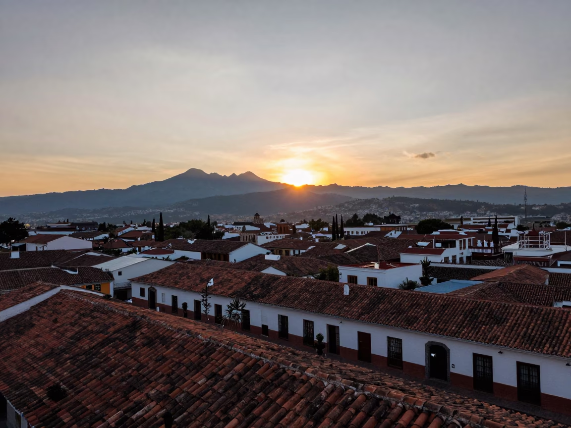 Quito Ecuador Sunset View Over Colonial Rooftops and Distant Andes Mountains in in Quito, Ecuador