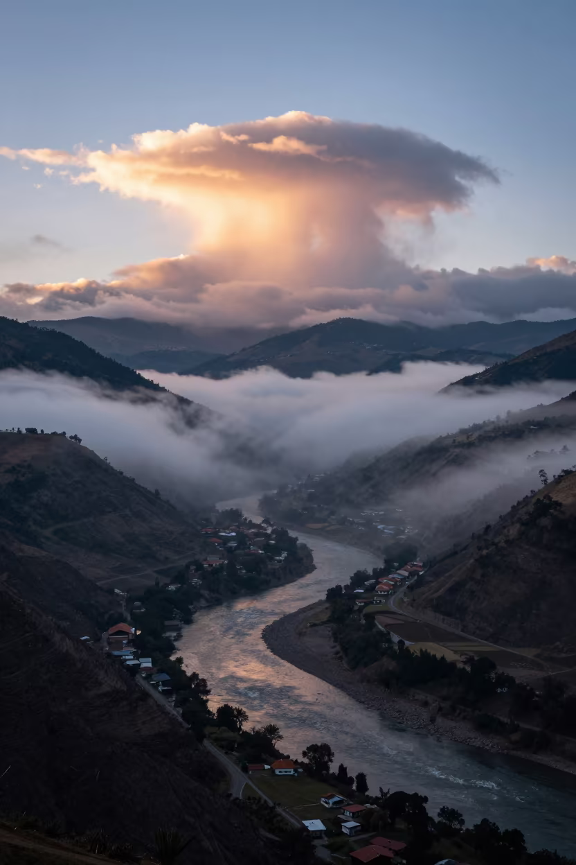 Radiation Fog Fills Cusco River Valley at Dawn in over a horizon of stacked thunderheads near San Cristobal, Cusco