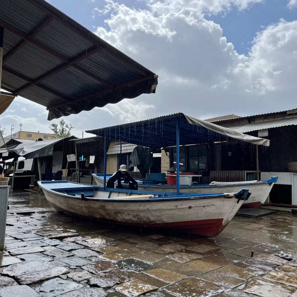Rain Drips from Market Canvas onto Cobblestones in at a floating market boat in Irbid