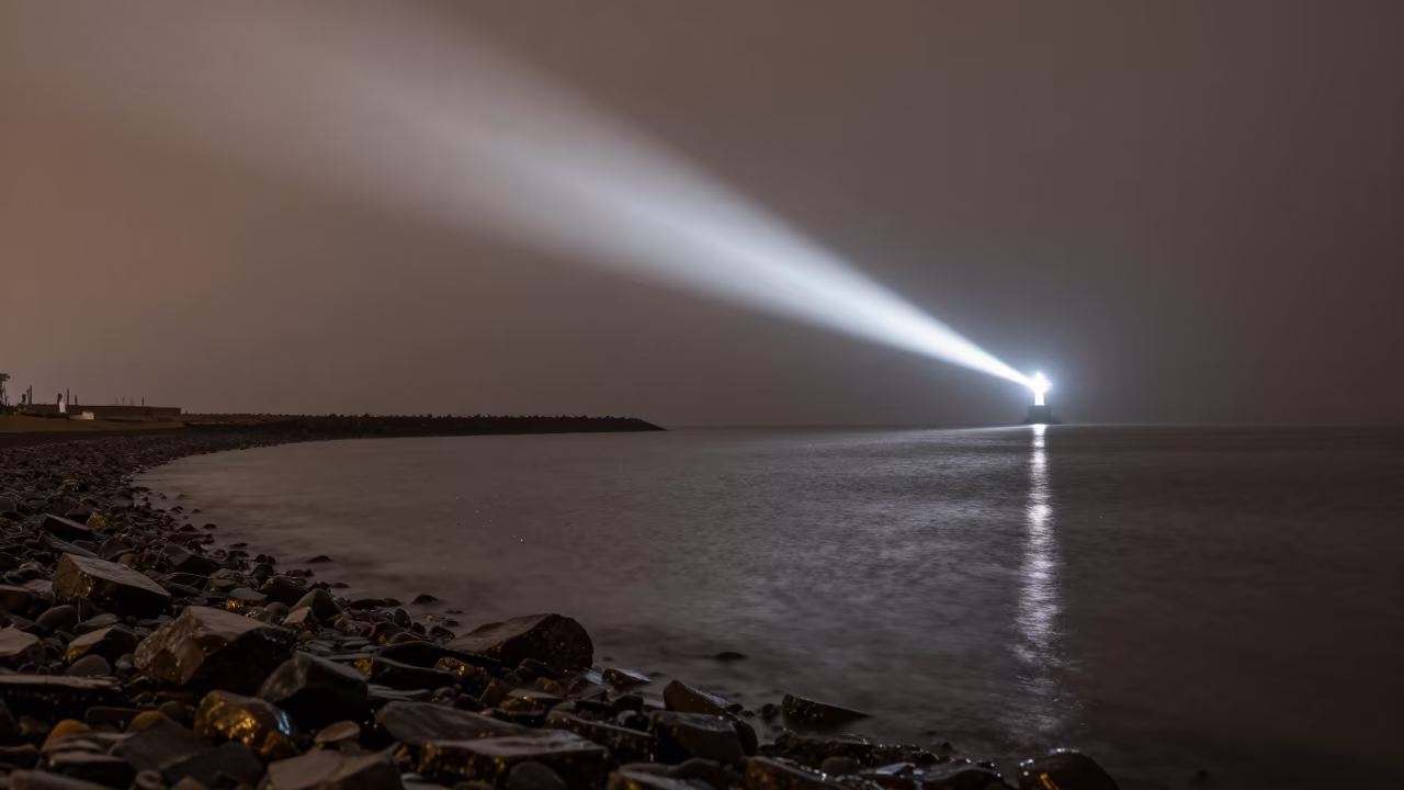 Rain Exploding on Puddle Under Lighthouse Beam in along a wave-cut shoreline in Jiangxi