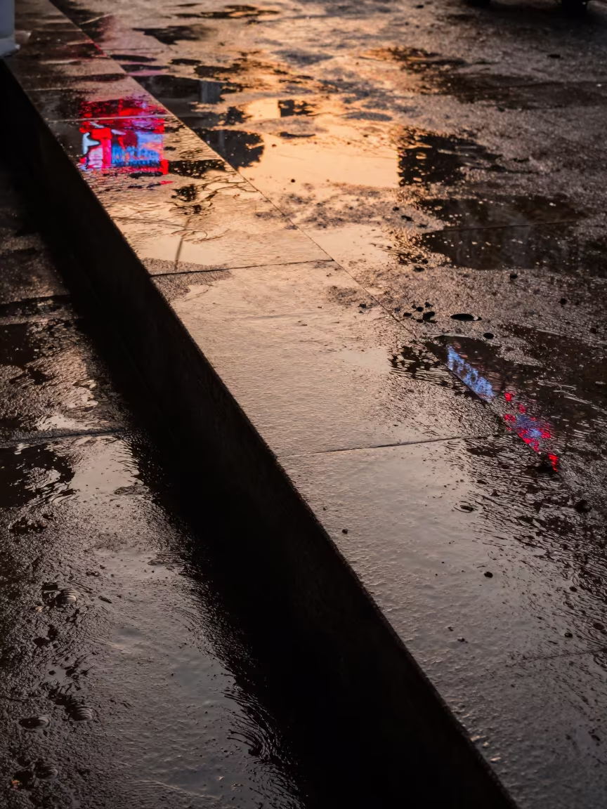 Rain Reflections on Stone Ledge Nagpur Evening in on a stone ledge in Nagpur