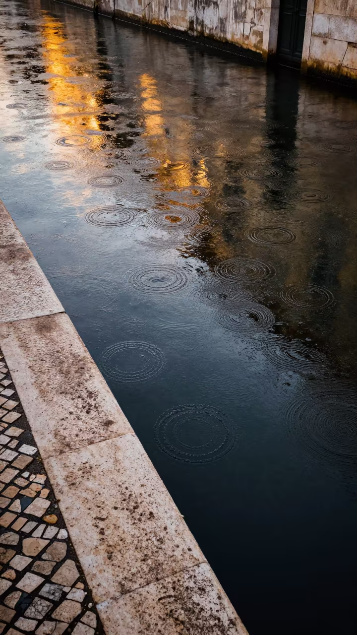 Rain Rings on Black Canal Water at Sunset in near Lisbon