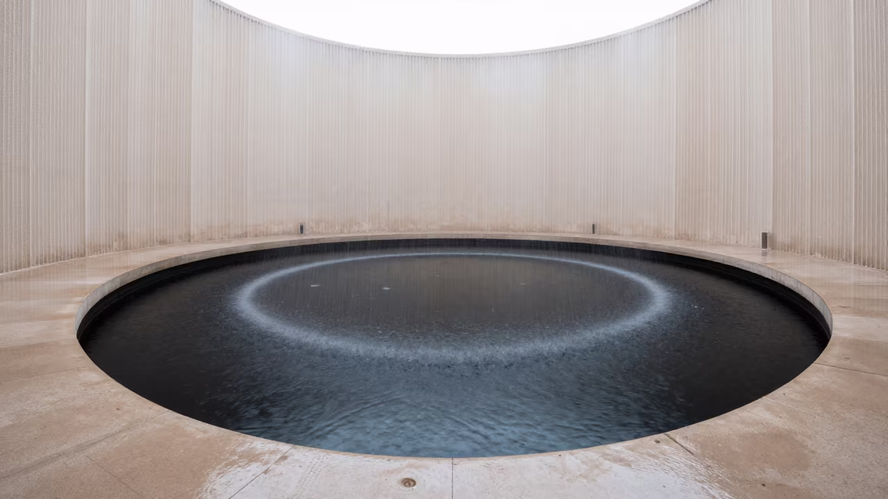 Rain Rings on Black Water in Agadir Lobby in inside a ribbed concrete lobby in Agadir