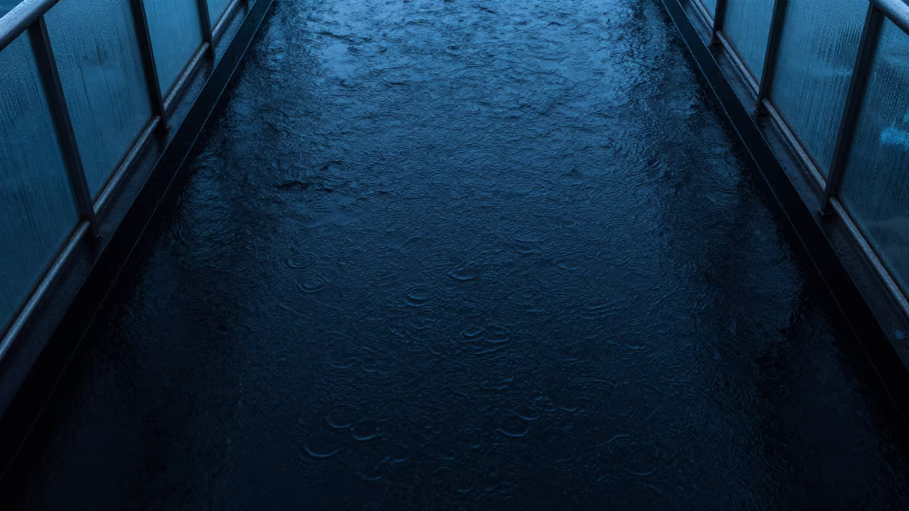 Rain Ripples on Black Water Twilight in inside a skylit passageway near Barranquilla