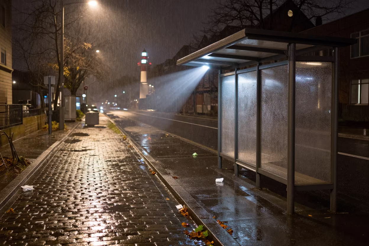 Rain Soaked Newspaper Stand Midnight Cologne in beside a steamed-up bus shelter in Cologne
