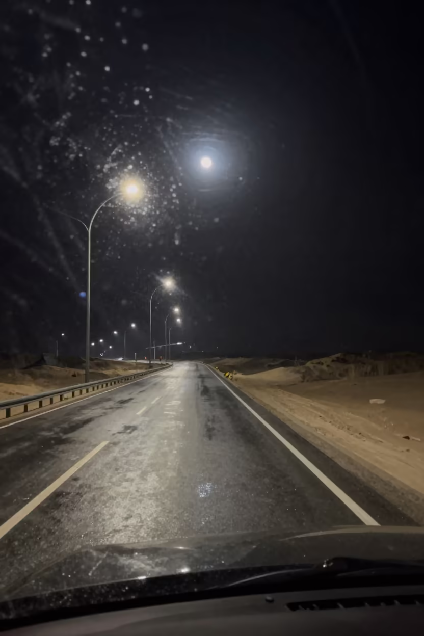 Rain Streaks on Car Windshield Turkmenistan Night in on a wind-open causeway in Turkmenistan