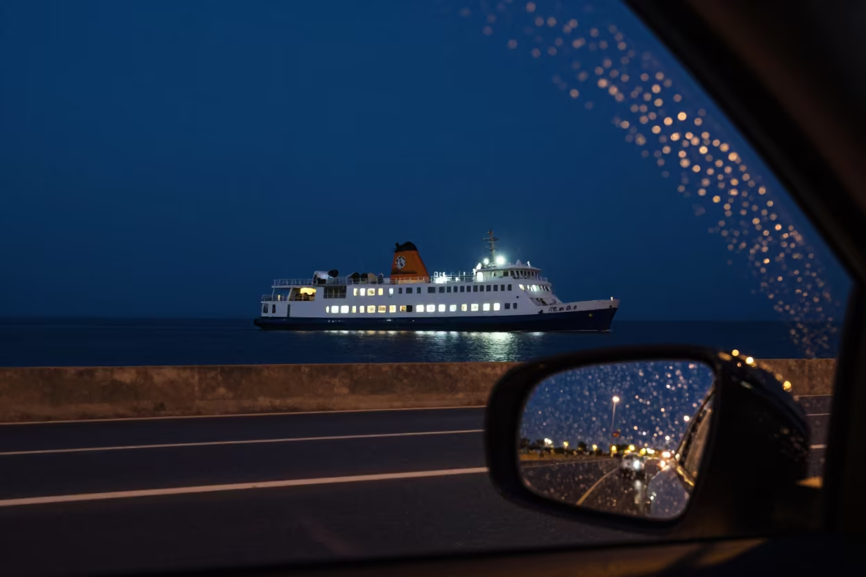 Rain Streaks on Ferry Windshield at Night in across a remote ferry crossing near Turkistan