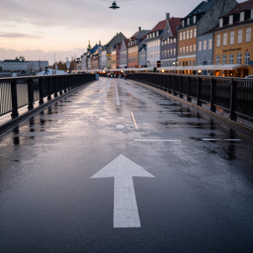 Rain-Swept Copenhagen Harbor Bridge Deck Markings Shining Under Early Dawn Light in in Copenhagen, Denmark