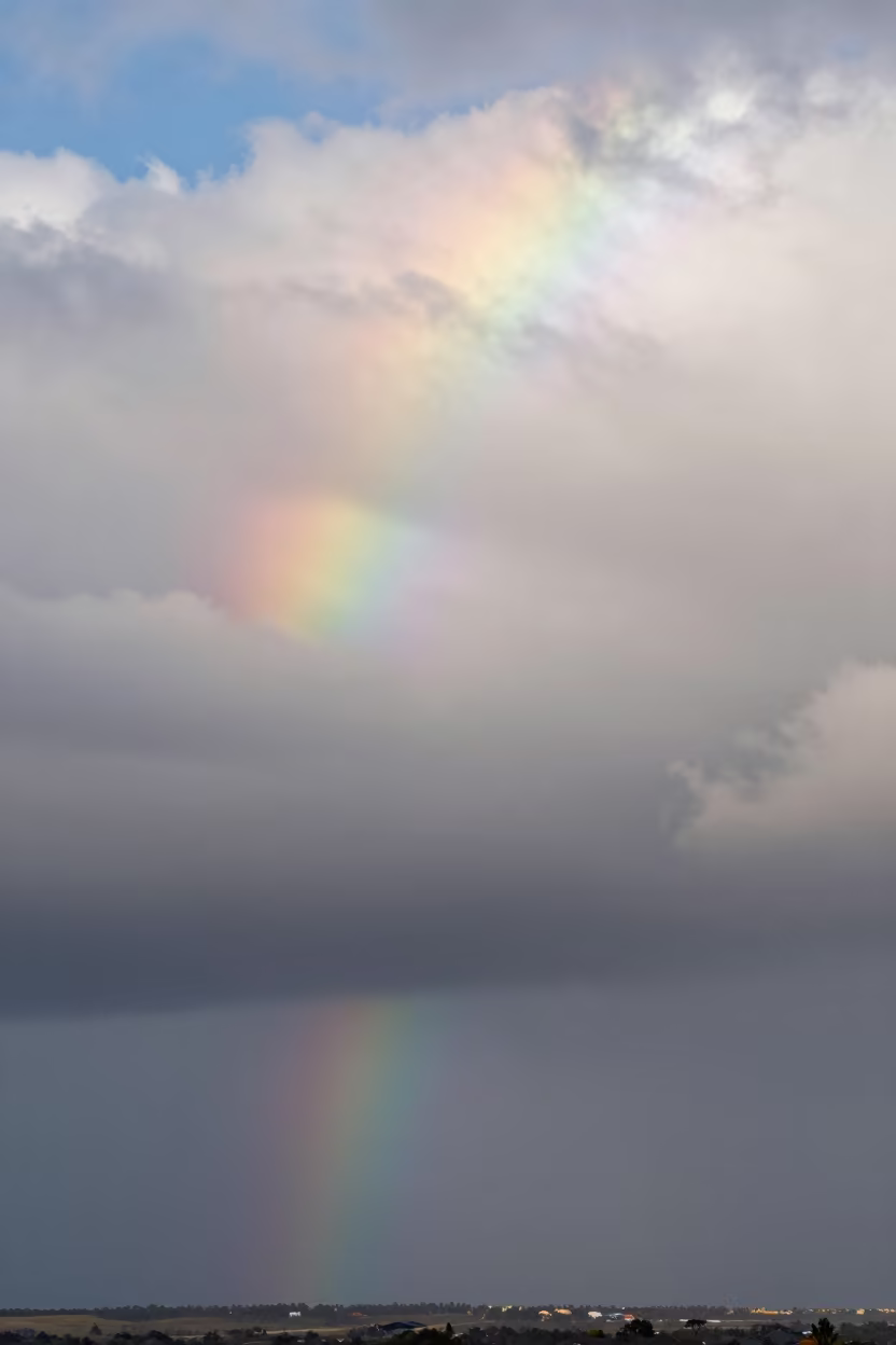 Rainbow Clouds Over Port Elizabeth Thunderheads in over a horizon of stacked thunderheads near Port Elizabeth