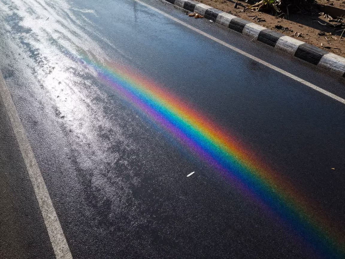 Rainbow Oil Slick on Wet Tarmac Pakistan in in Pakistan