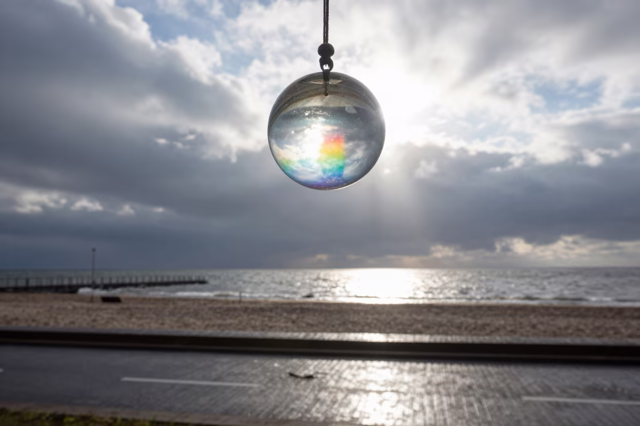 Rainbow Spectrum from Crystal Suncatcher Over Storm in over a horizon of stacked thunderheads near Rzeszów