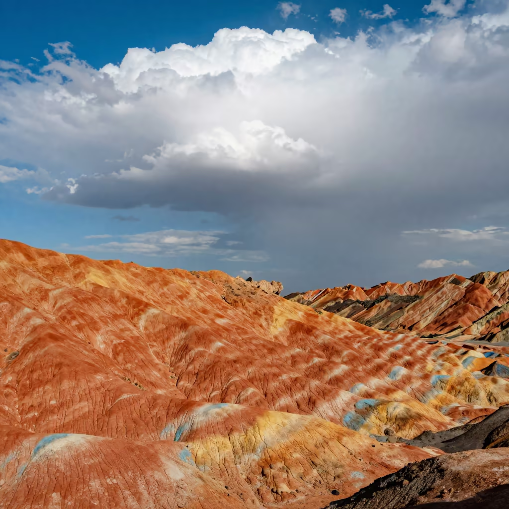 Rainbow Striped Ridges Silhouetted Against Thunderheads in over a horizon of stacked thunderheads near Rufisque