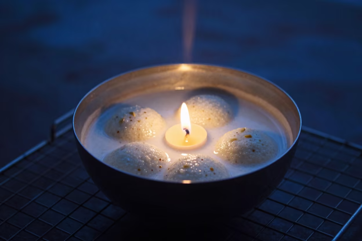 Ras Malai in Cardamom Milk on Bakery Rack in on a bakery cooling rack in Oskemen