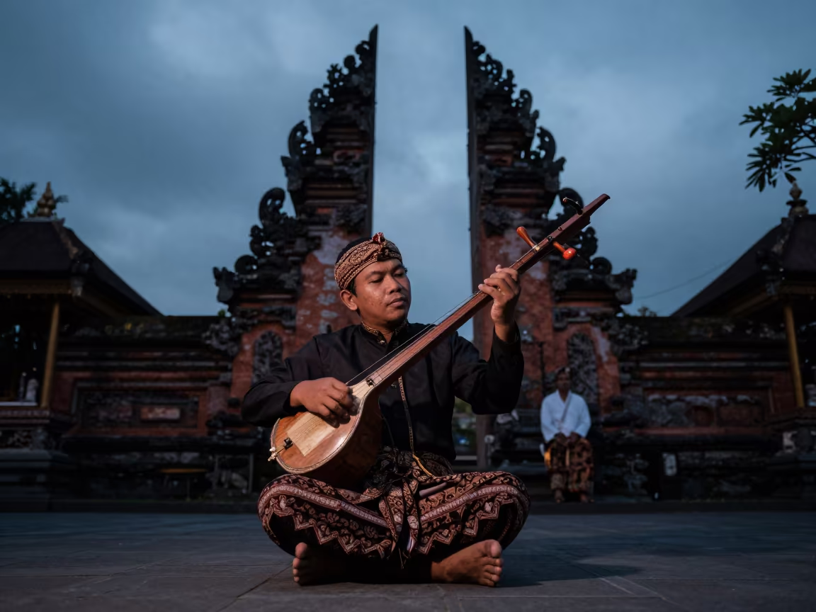 Rebab Player in Javanese Gamelan Temple Precinct in in a temple precinct in Kemang, Jakarta