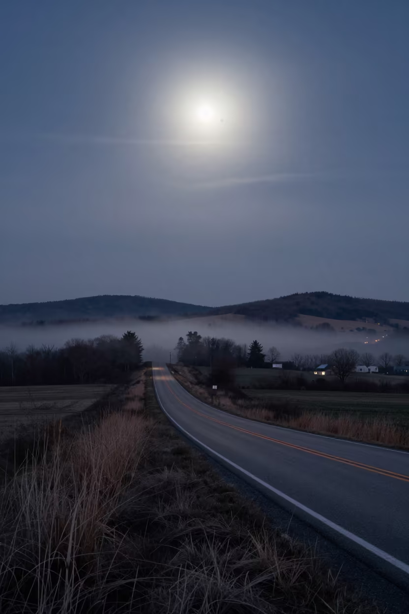 Red Taillights on Farm Lane Through Alpine Mist in from a quiet alpine saddle in Indiana