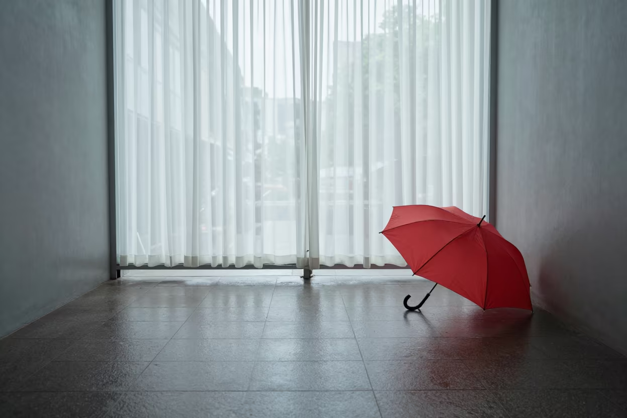 Red Umbrella on Wet Pavement in Jakarta Skylit Passage in inside a skylit passageway in Glodok, Jakarta
