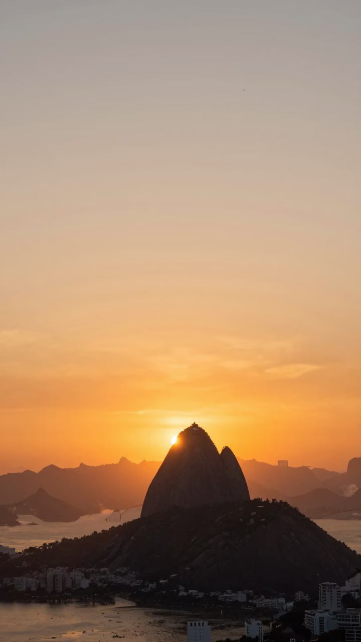 Rio De Janeiro Redeemer at As The Sun Drops Toward The Horizon in in Rio de Janeiro, Brazil