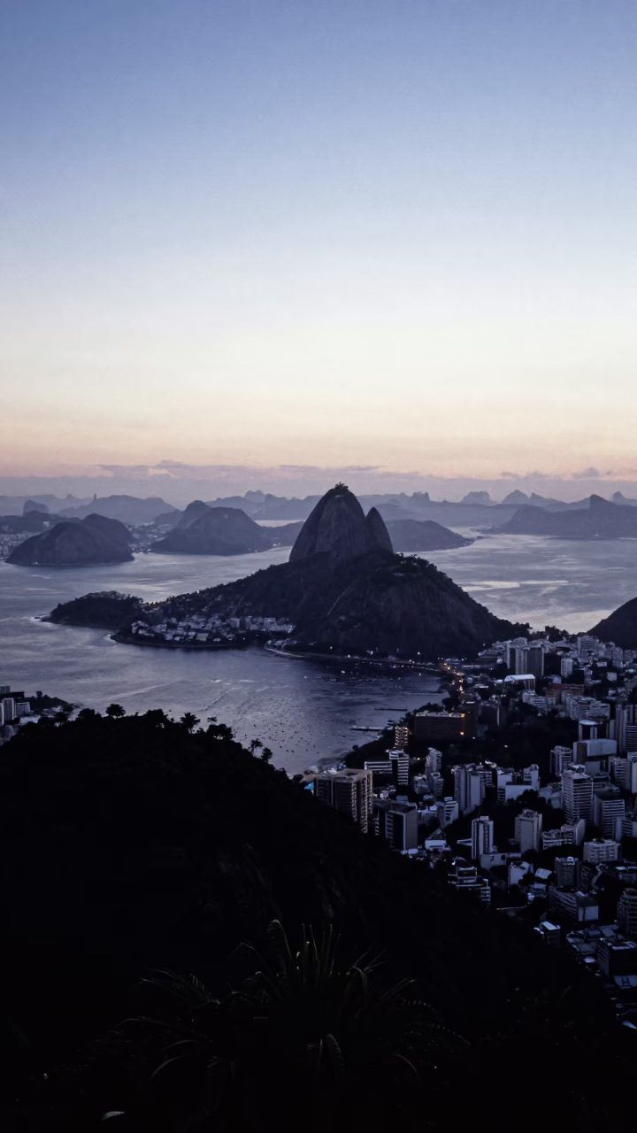 Rio de Janeiro Sunrise Horizon View Over Coastal Hills and Dense Urban Favela Neighborhood in in Rio de Janeiro, Brazil
