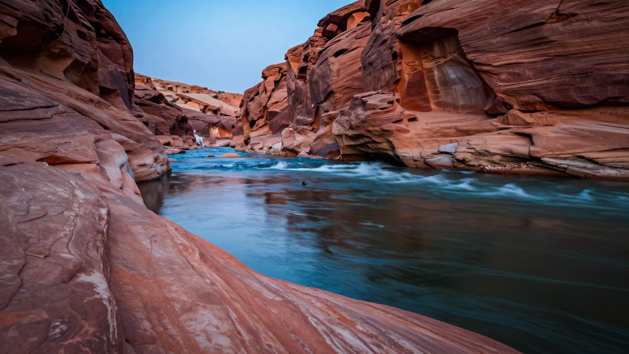 River in Red Sandstone Canyon Evening Light in along a wave-cut shoreline near Riyadh