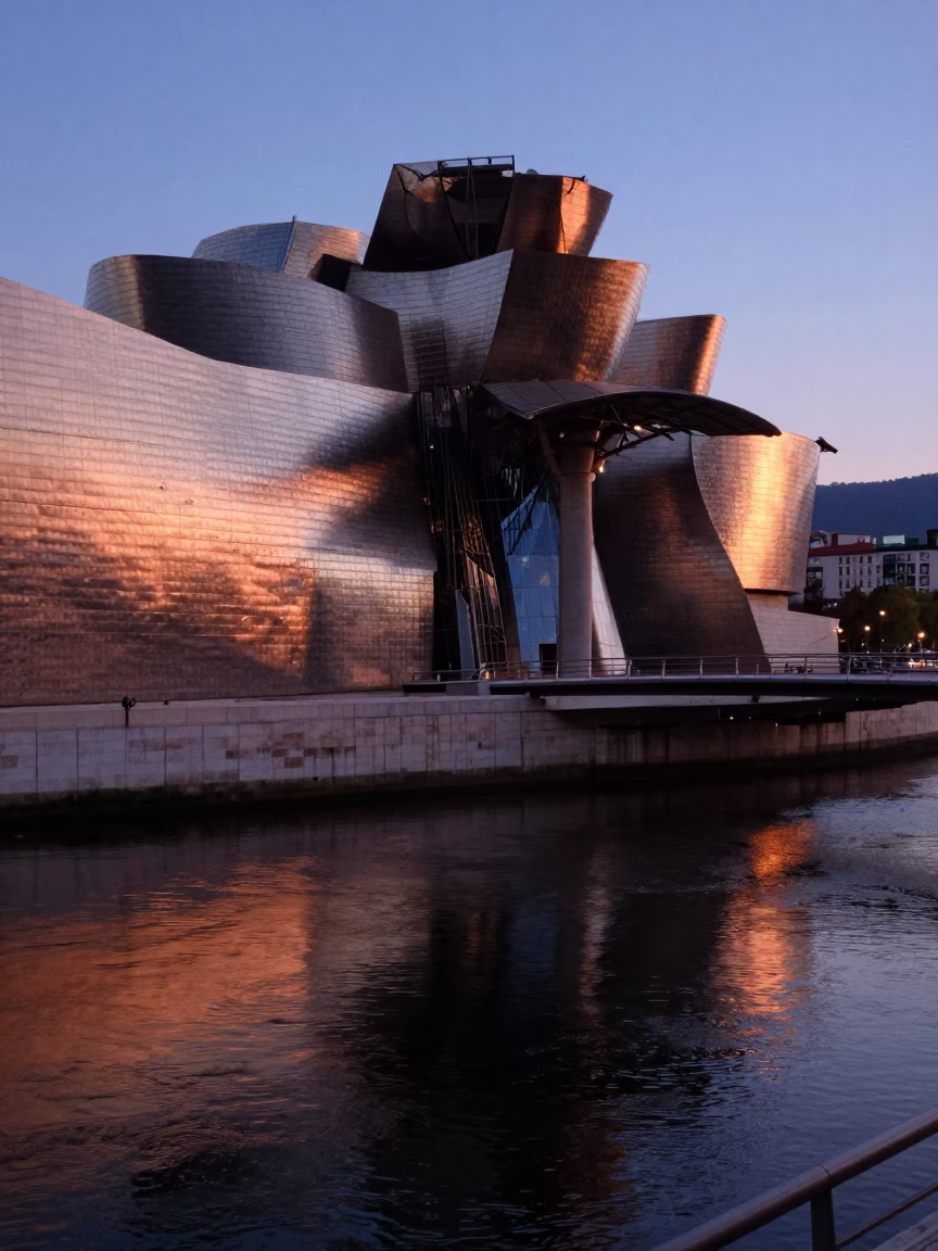 River Reflections at Copper-toned Light Before Dusk in Bilbao in in Bilbao, Spain