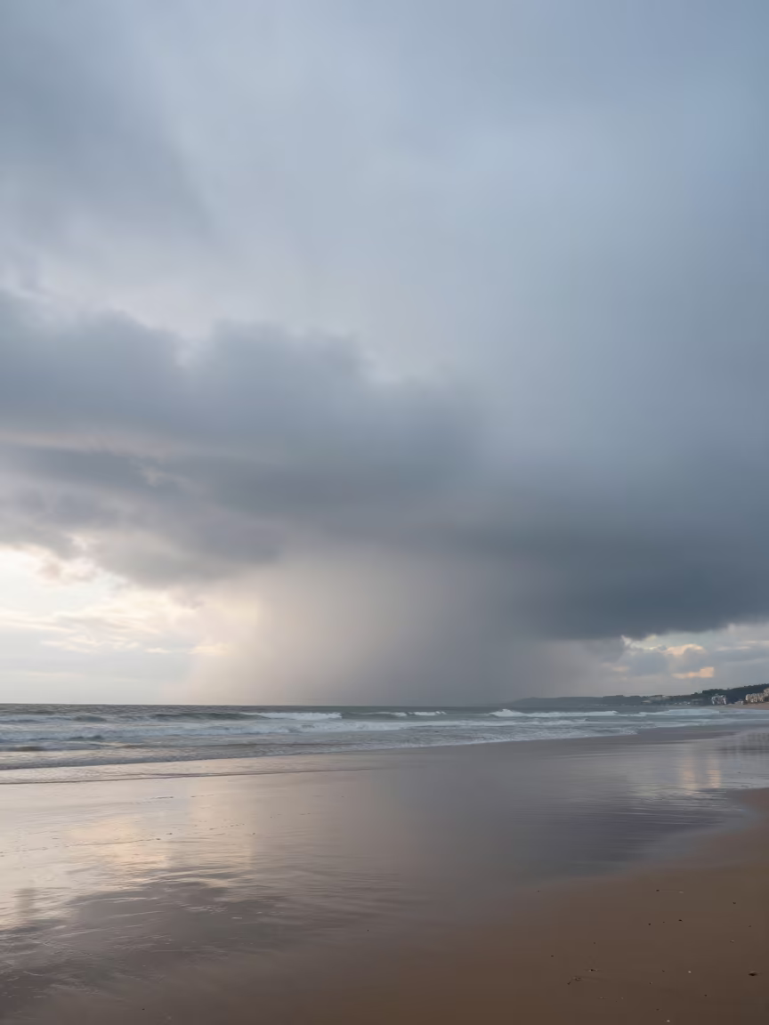 Roll Cloud Over Marseille Beach at Dawn in over a horizon of stacked thunderheads near Marseille