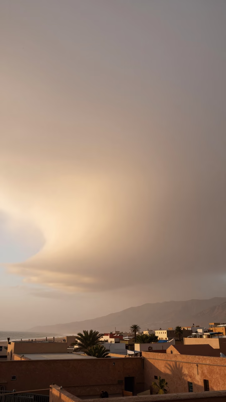 Roll Cloud Stretching Over Marrakesh Dawn in over a horizon of stacked thunderheads near Marrakesh